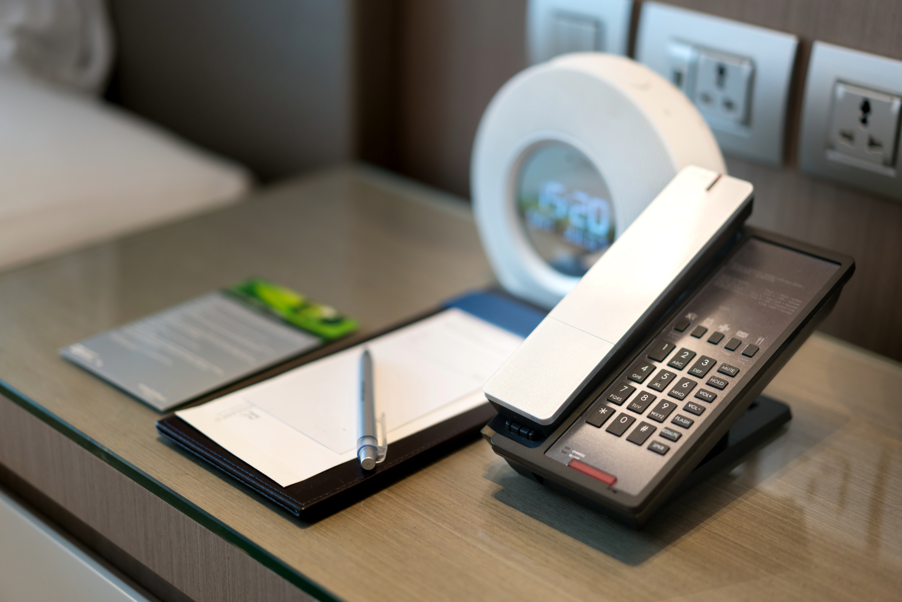 Person on hotel phone